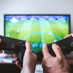 Two People Playing Sony Ps4